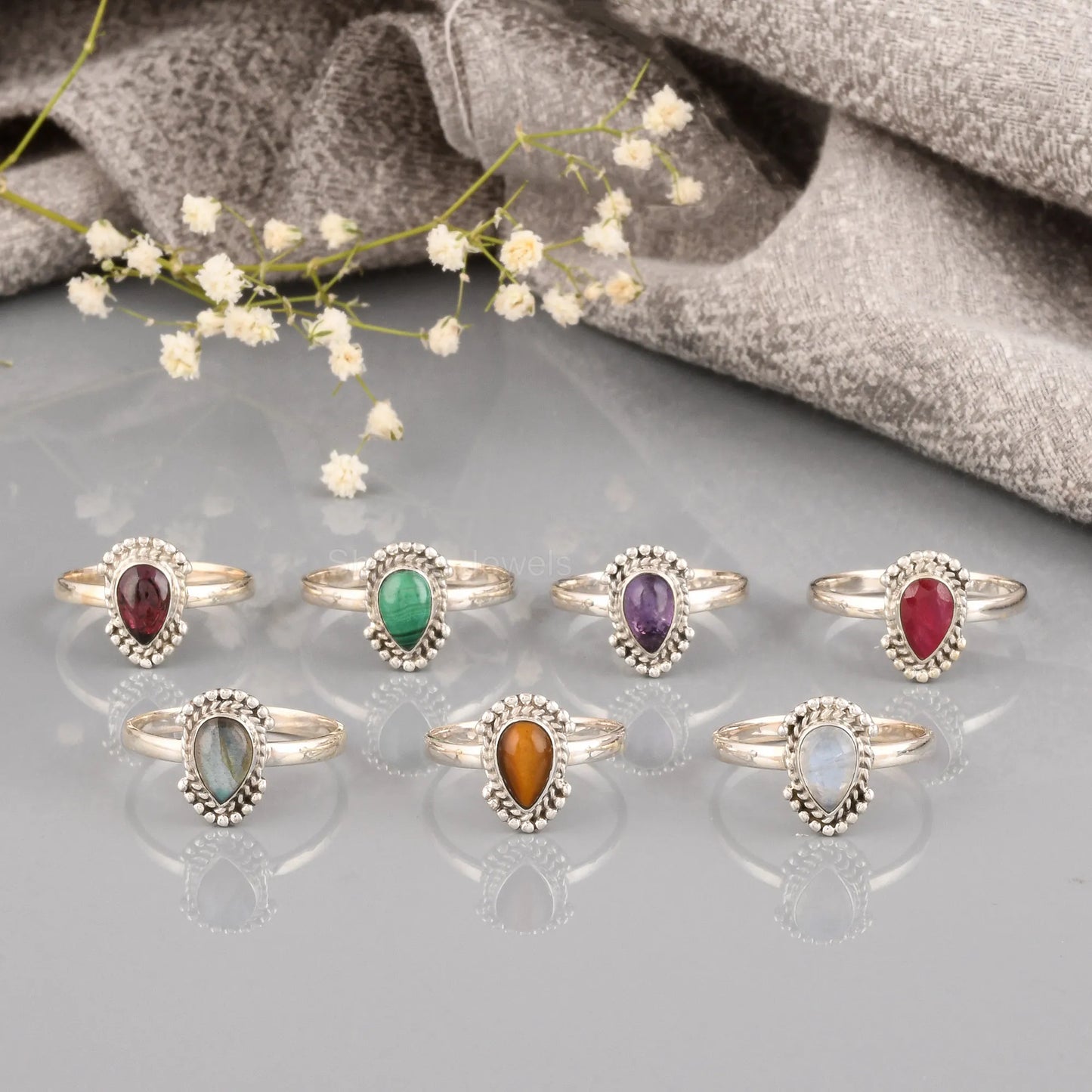 faceted red garnet gemstone ring – 925 silver