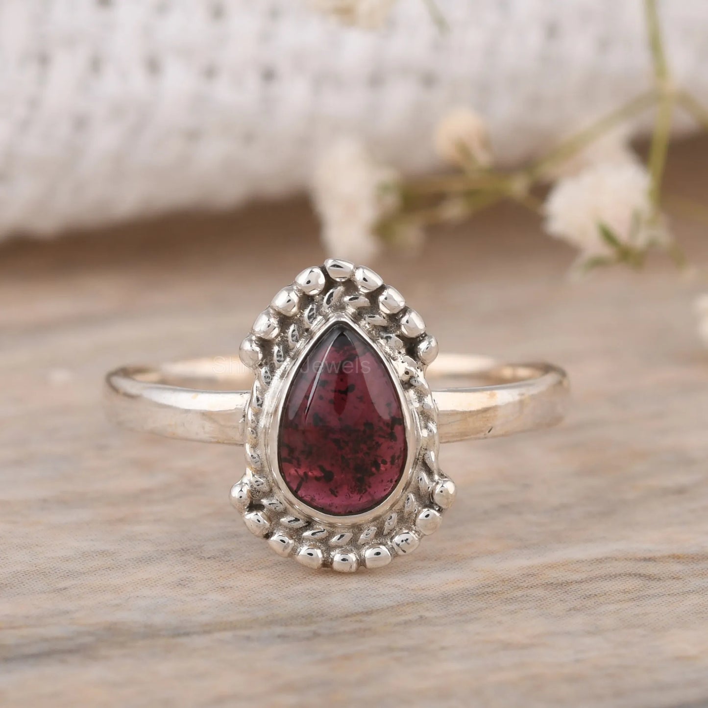 handmade pear red garnet ring in sterling silver

