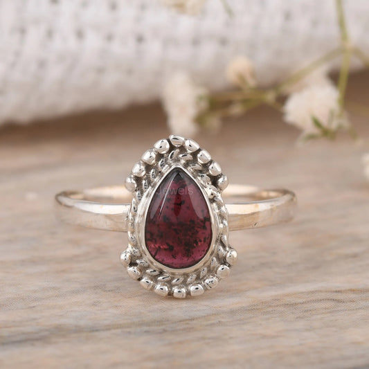 handmade pear red garnet ring in sterling silver

